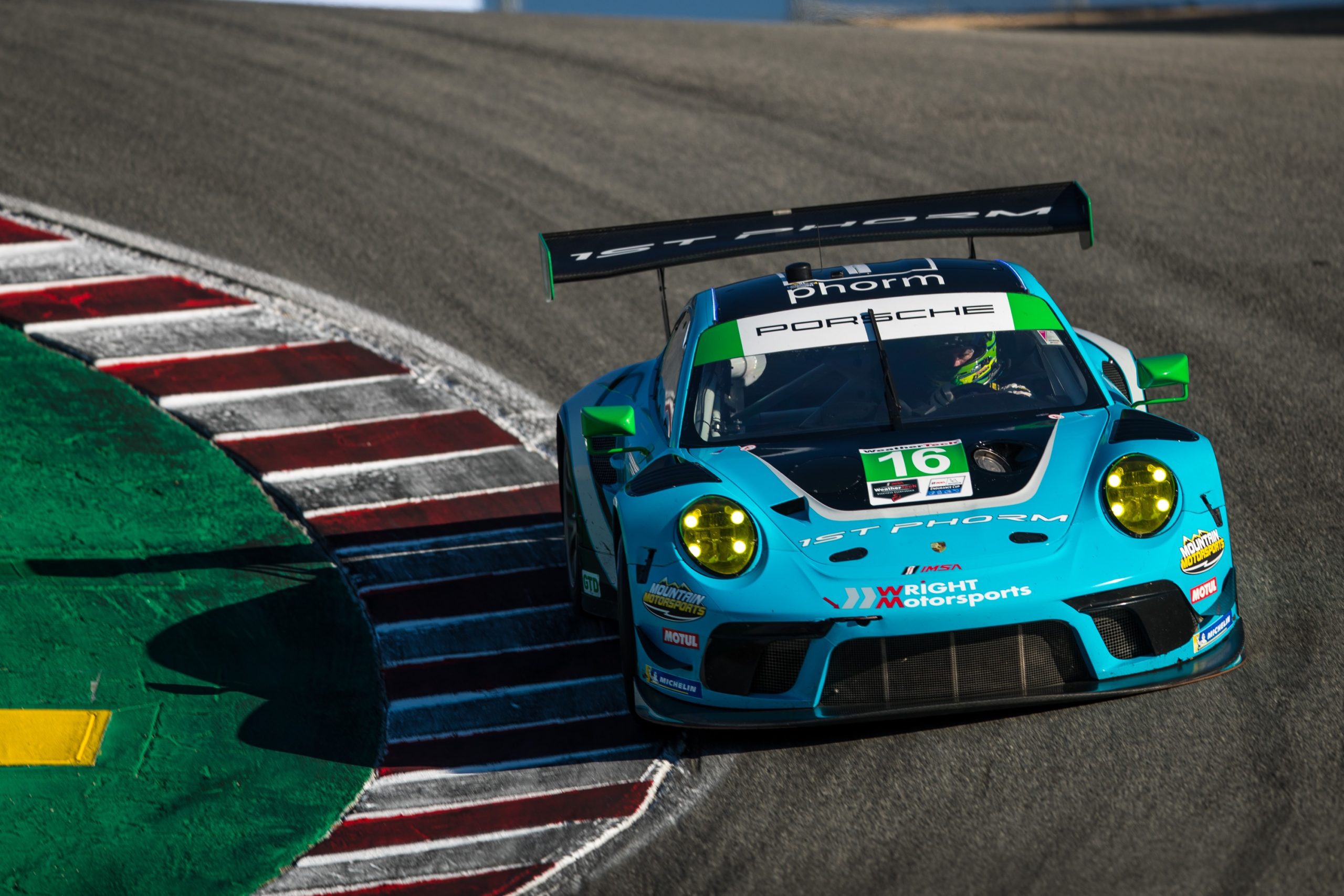 A blue and white racing Porsche 911