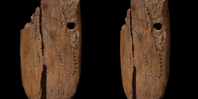 This decorated mammoth ivory pendant is 41,500 years old thumbnail