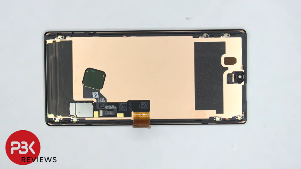 The back of the screen is a large copper radiator.  You can see how thin the fingerprint sensor is on the left - it's just a sticker.  Just above the camera lens on the right side is the cutout for the proximity and light sensors below the screen. 
