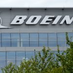 A Boeing logo on the exterior of the company's headquarters.