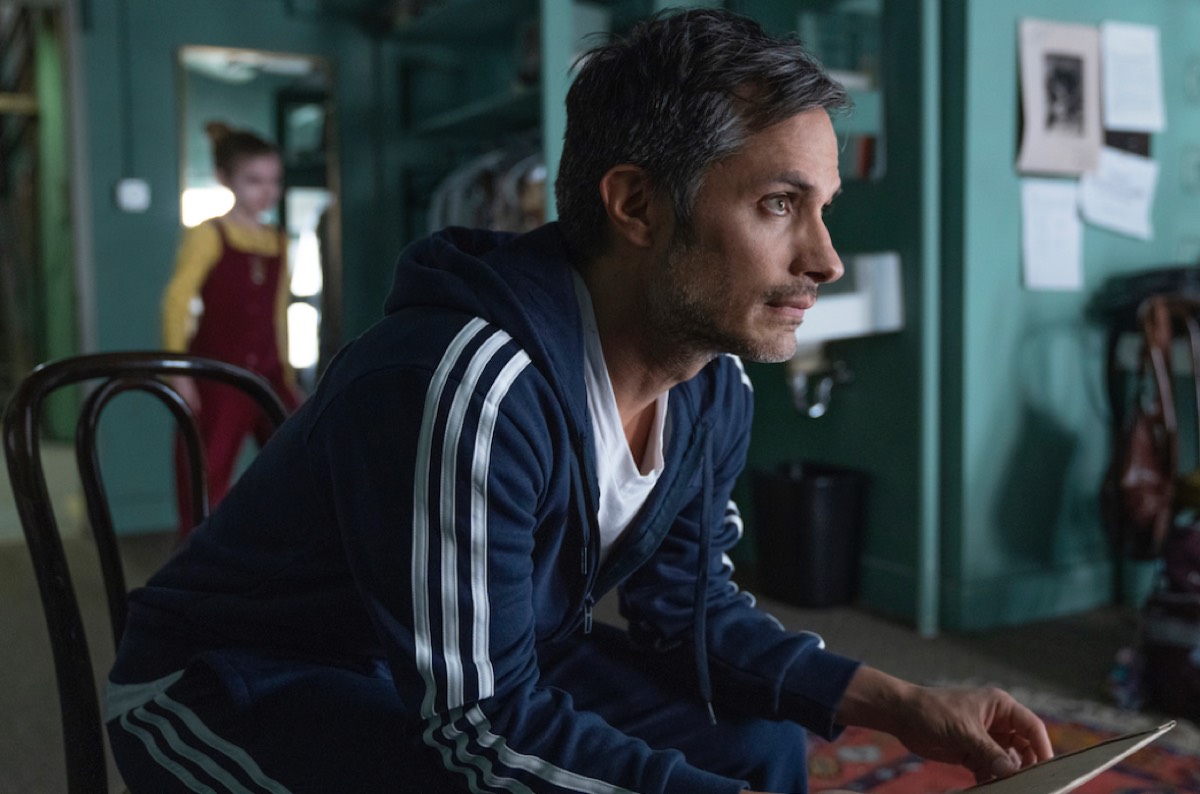 Man in track suit with intense expression