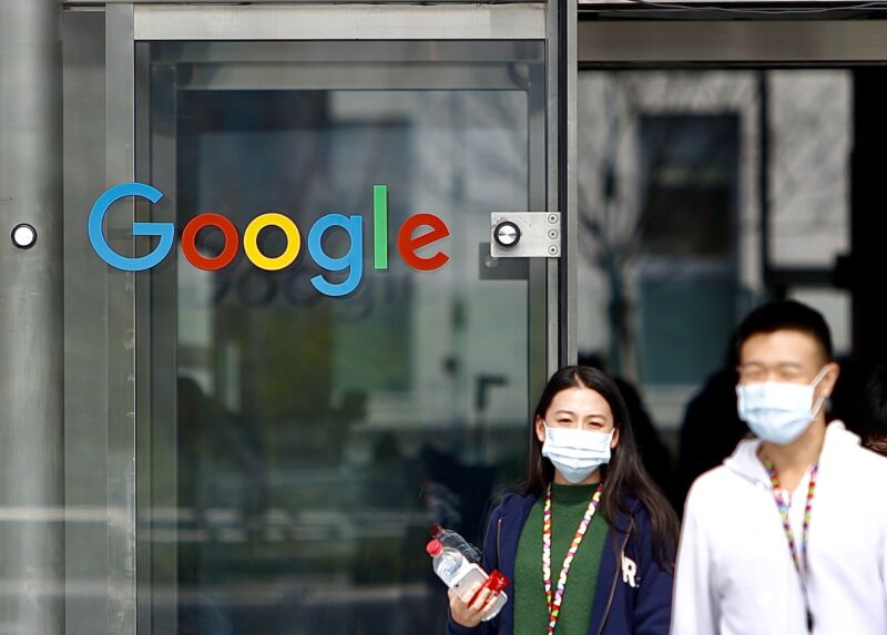 People walk out of a Google office building in Taipei, Taiwan, on January 29, 2021.