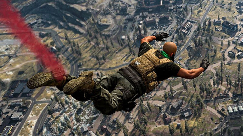 Screenshot from a video game shows a paratrooper after jumping from an aircraft.