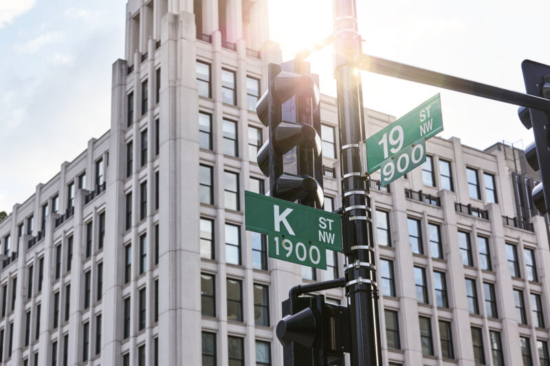 Street sign for K Street, the Wall Street of political influence in the US capital.