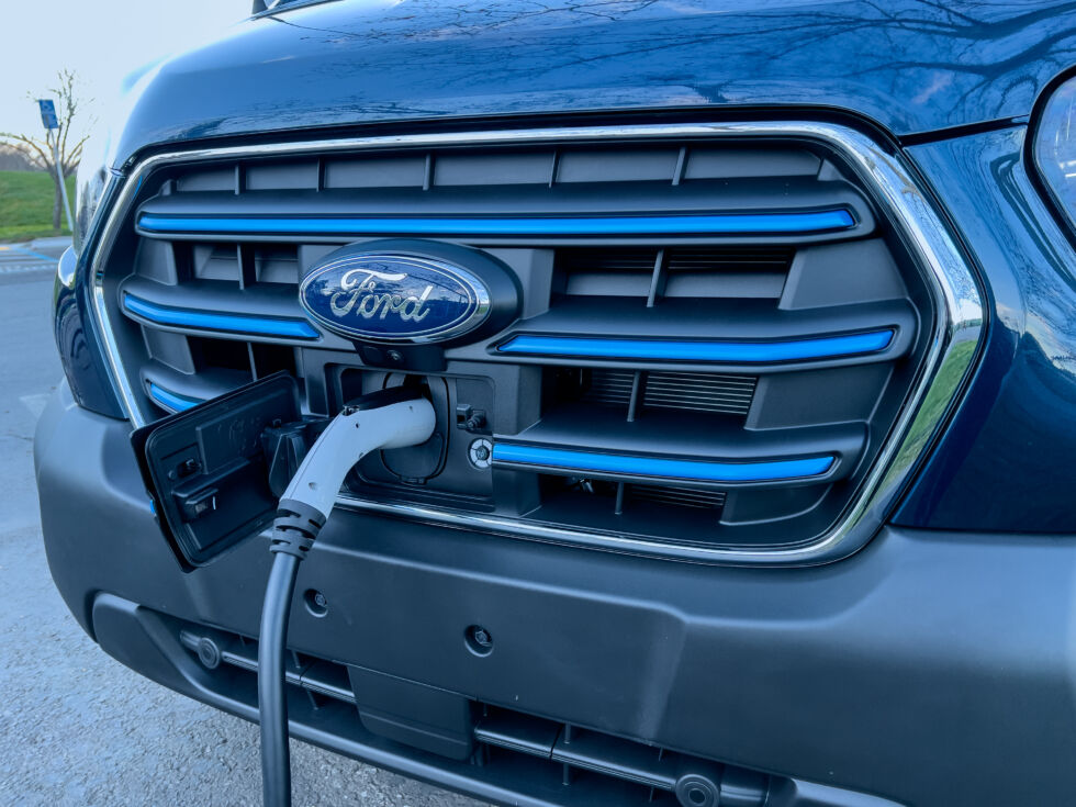 This Ford E-Transit has its charging port at the front of the van. Here, it's connected to a level 2 charger.