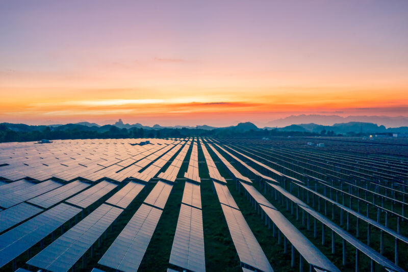 Technology Image of a solar field at sunset.