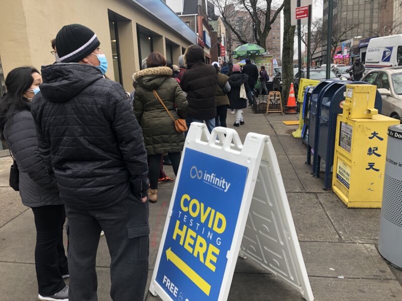 Long lines at a mobile COVID-19 testing tent in Queens, New York, on December 29, 2021.