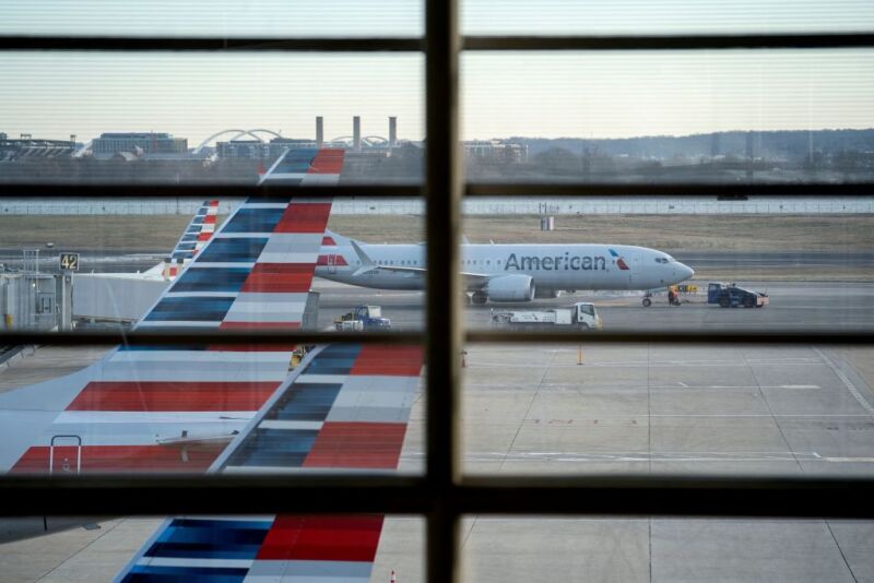 American Airline planes sit on the tarmac at Ronald Reagan Washington National Airport (DCA) in Arlington, Virginia, on January 15, 2022. (Photo by Stefani Reynolds / AFP) (Photo by STEFANI REYNOLDS/AFP via Getty Images)
