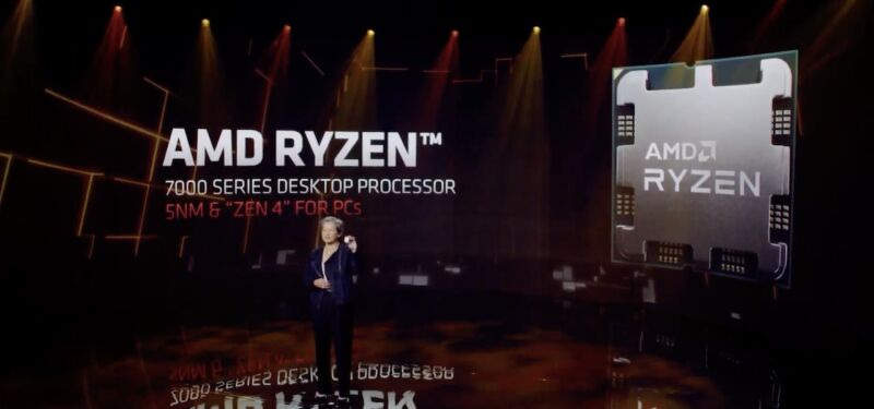 AMD's Lisa Su holds up an early example of a Zen 4 CPU.