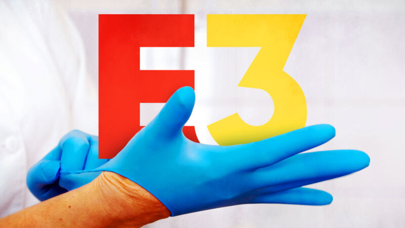 Hands put on medical gloves in front of an E3 logo.