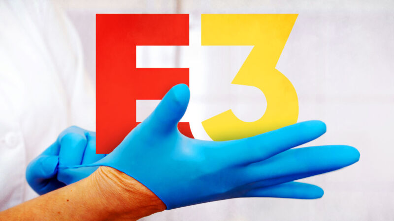 Les Mains Mettent Des Gants Médicaux Devant Un Logo E3.