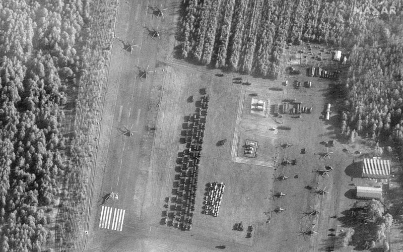 A Maxar satellite image shows the buildup of Russian vehicles and helicopers on an airfield in Belarus prior to the invasion of Ukraine.