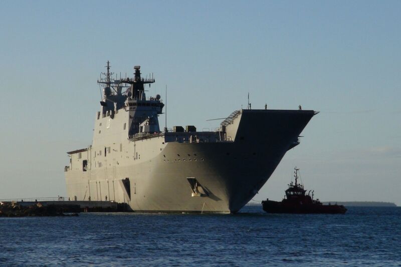 This photo shows the Australian Navy's HMAS <em>Adelaide</em> docked at Vuna Wharf in the Tongan capital of Nukualofa on January 26, 2022. The <em>Adelaide</em> delivered aid following the January 15 eruption of the nearby Hunga Tonga-Hunga Ha'apai underwater volcano. 