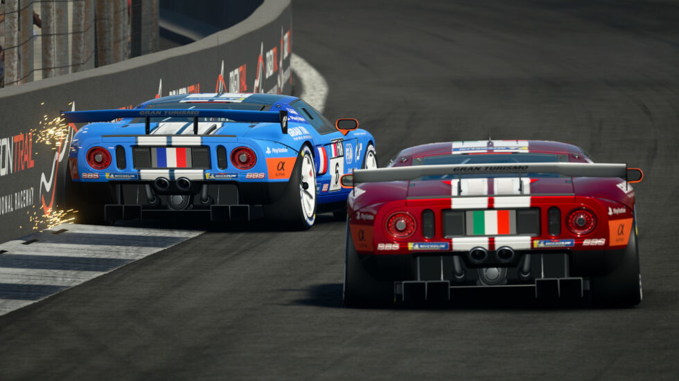 Valerio Gallo (Williams_BRacer) of Italy battles with Baptiste Beauvois (r8gesports_tsutsu) of France in the Nations Cup Grand Final during the <em>Gran Turismo</em> World Series Finals 2021 run on the fictional Dragon Trail circuit on December 5, 2021, in London, England. Gallo was another one of the human expert players to compete against GT Sophy and was eventually able to beat its time around the Maggiore track.