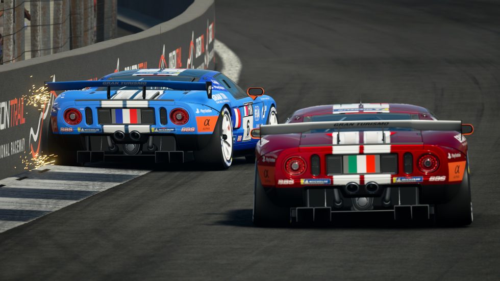 Valerio Gallo (Williams_BRacer) of Italy battles with Baptiste Beauvois (r8gesports_tsutsu) of France in the Nations Cup Grand Final during the <em>Gran Turismo</em> World Series Finals 2021 run on the fictional Dragon Trail circuit on December 5, 2021, in London, England. Gallo was another one of the human expert players to compete against GT Sophy and was eventually able to beat its time around the Maggiore track.