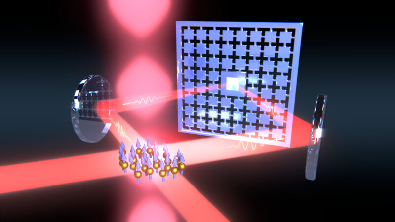 The atoms (center foreground) alter a laser so it extracts energy from a membrane (blue).