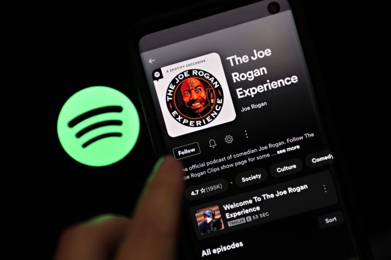 Spotify's Joe Rogan Experience podcast seen on the screen of a smartphone.
