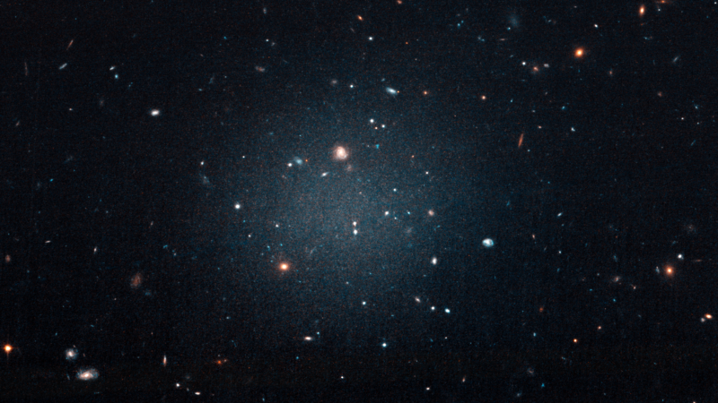 The slightly hazy, light patch in the middle of the image is the DF2 galaxy, so diffuse that other galaxies are clearly visible behind it.