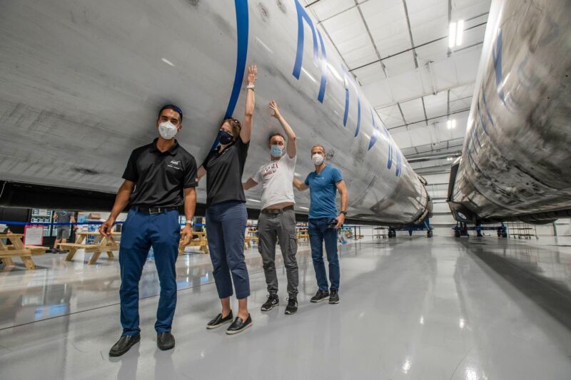 European astronaut Matthias Maurer, in the white t-shirt, joins his Crew-3 mates in hugging a Falcon 9 rocket at SpaceX's headquarters in Hawthorne, California.