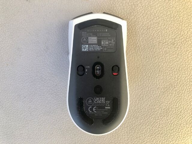 The mouse's underside lets you pick between the dongle and Bluetooth connection, turn the mouse off, and adjust CPI. 