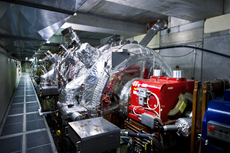 Image of some bizarre looking machinery covered in silvery foil.