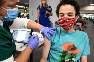 CDC updates COVID vaccine recommendations, but not how RFK Jr. wanted