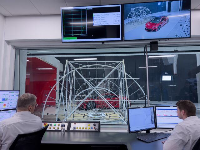 Engineers supervise an aeroacoustic test in the wind tunnel.