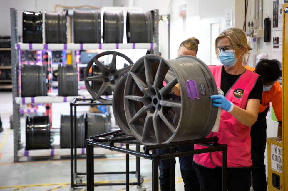 An unfinished wheel is inspected during manufacture.