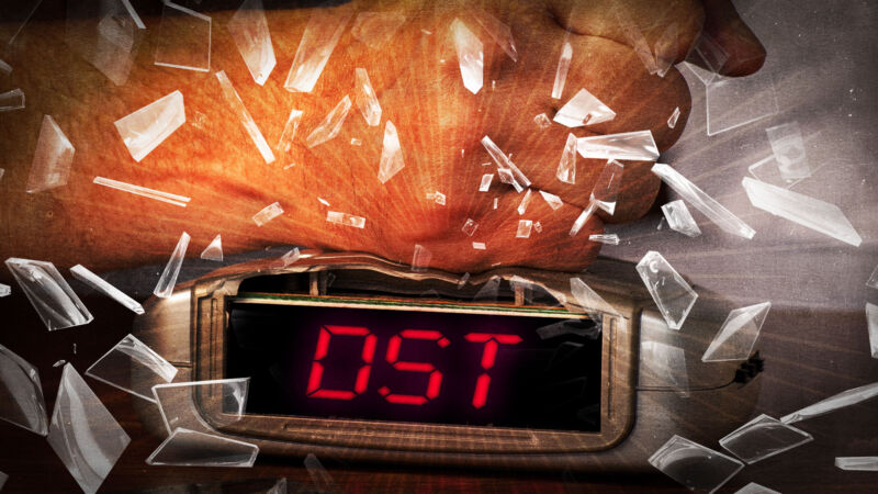 Cartoonish image of a hand smashing an alarm clock.