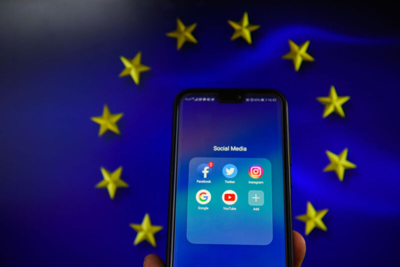 KRAKOW, POLAND - 2018/08/20: Social media apps with European Union flag are seen in this photo illustration. The European Commission is planning issue a regulation that allows to fine social media platforms and websites if they don