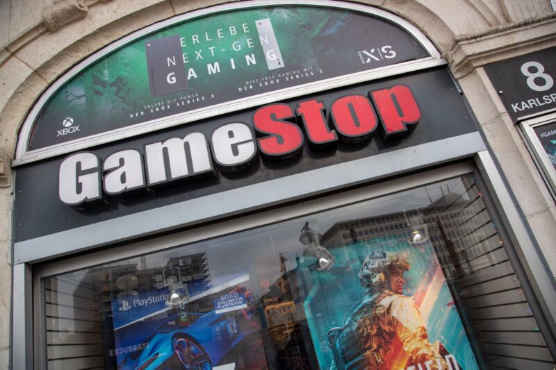 The GameStop logo seen over the door leading into a GameStop store in Munich.