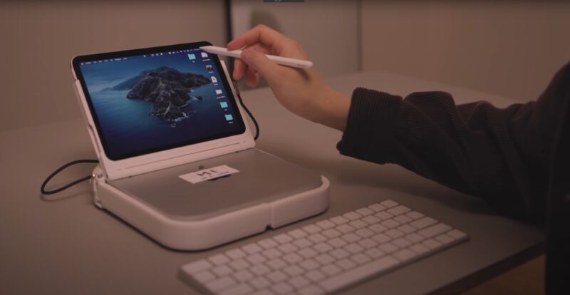 The device has a touchscreen instead of an integrated keyboard and touchpad.