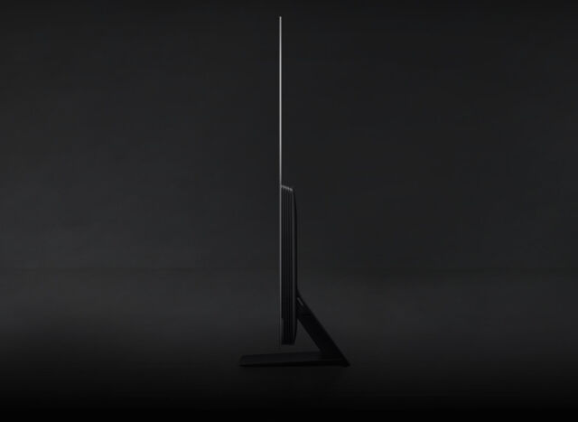 The Samsung OLED is 1.6 inches thick without its stand. 
