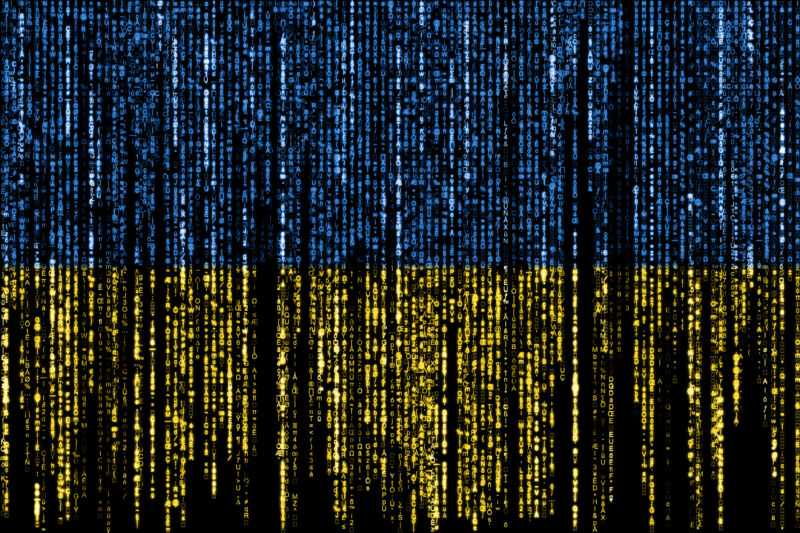 Flag of Ukraine on a computer binary codes falling from the top and fading away.