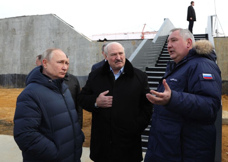 Roscosmos chief Dmitry Rogozin (right) speaks to Russia President Vladimir Putin (left) and Belarus President Alexander Lukashenko during their visit at the Vostochny cosmodrome on Tuesday.