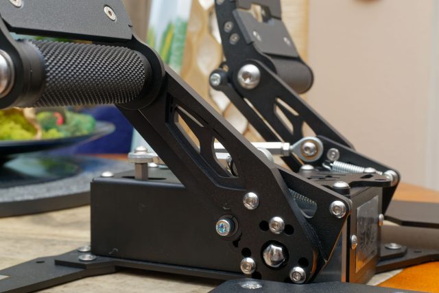 The RH Rotors sitting on a table. Note again that cool-looking helicopter cutout on the pedal arms.