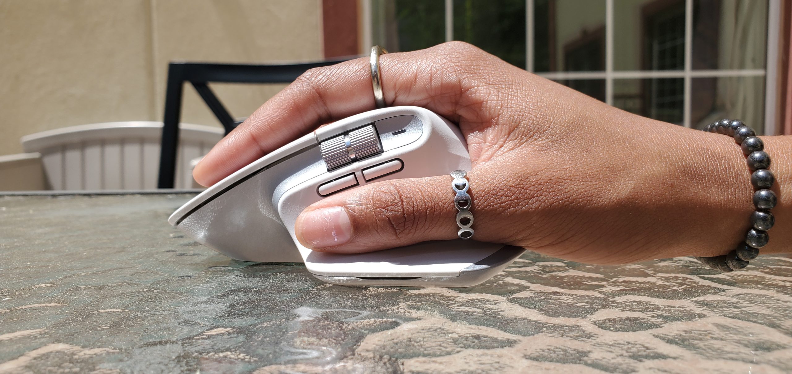 Palm gripping the MX Master 3S.