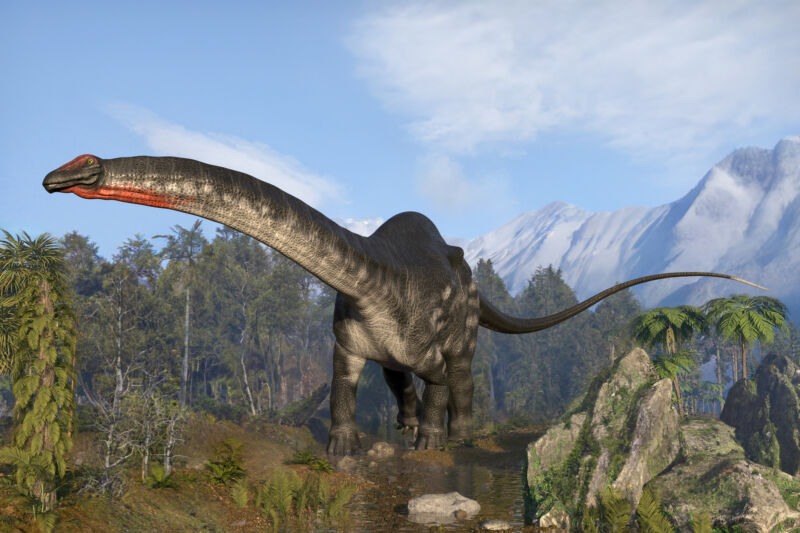 Image d'un sauropode dans un environnement luxuriant.
