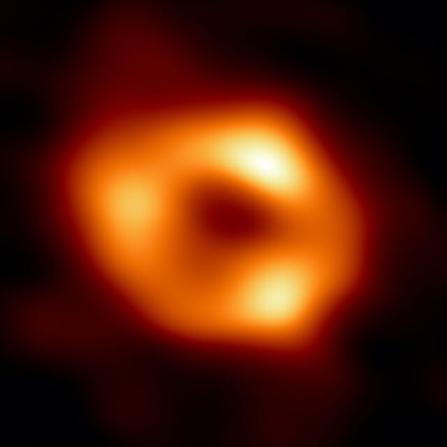 This is the first image of Sgr A*, the supermassive black hole at the centre of our galaxy. It’s the first direct visual evidence of the presence of this black hole. It was captured by the Event Horizon Telescope (EHT).