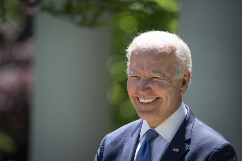 US President Joe Biden smiles during an event at the Rose Garden of the White House.