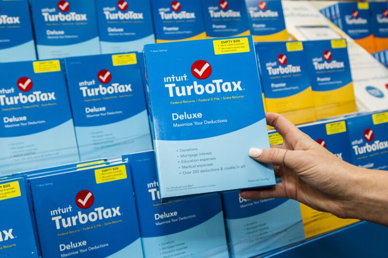 Boxed versions of TurboTax software sit on a store shelf.
