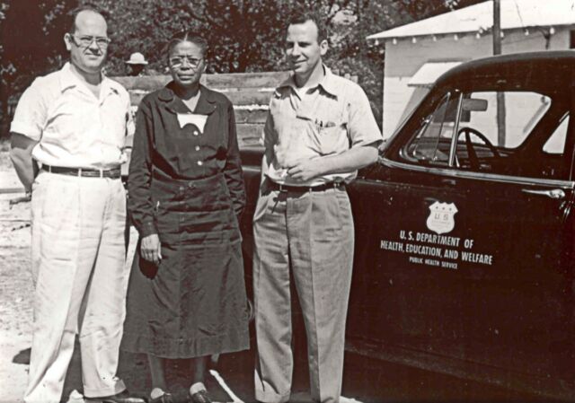 (l-r) Dr, David Allbritton, Nurse Eunice Rivers, and Dr. Walter Edmondson conducting an annual roundup in Macon County, Georgia, 1953.
