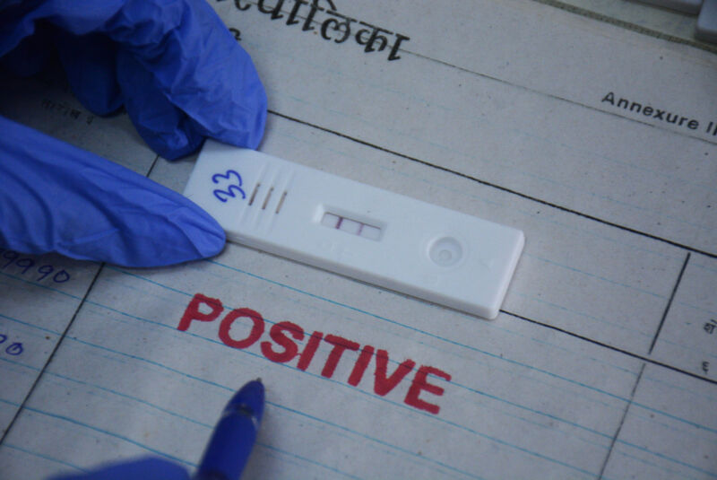 MUMBAI , INDIA JUNE 7: A health worker takes swab samples from a citizen for Covid-19 testing after the rise in cases in the city, at TMC's C.R. Wadia Hospital testing center, Thane, on June 7, 2022 in Mumbai, India.