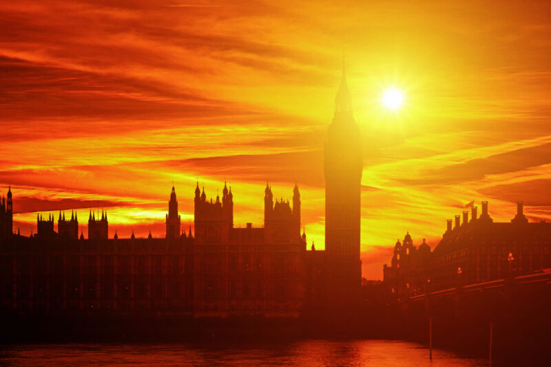 A red-orange sky over the Houses of Parliament.
