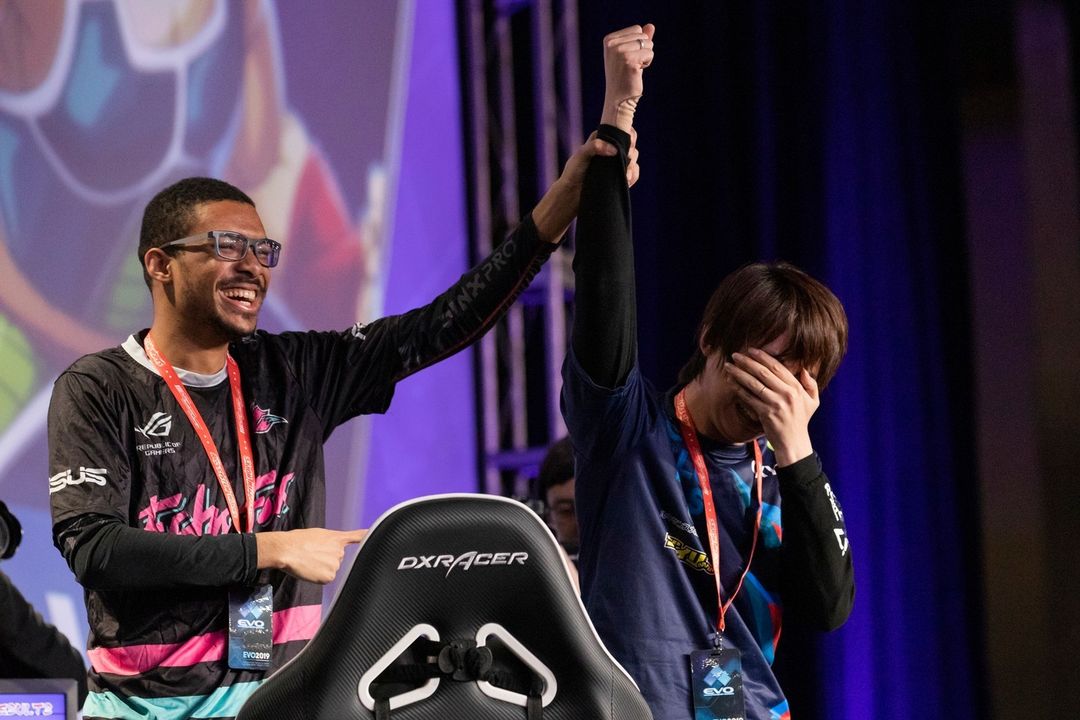 Dominique “SonicFox” McLean congratulates Goichi “GO1” Kishida for winning the grand finals of Dragon Ball FighterZ at Evo 2019.