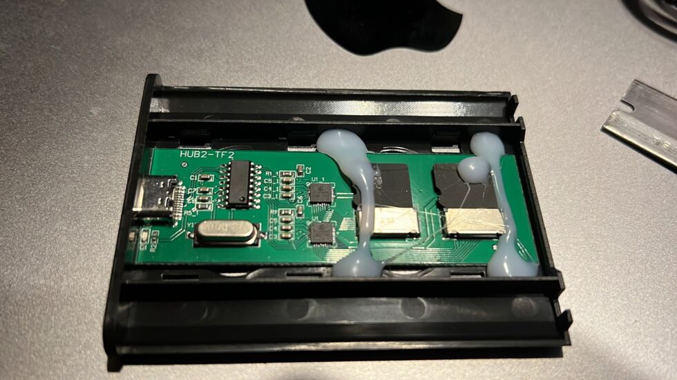 On the inside, this "SSD" features what appears to be a pair of microSD cards or some other kind of cheap, low-capacity flash memory hot glued to a circuit board.
