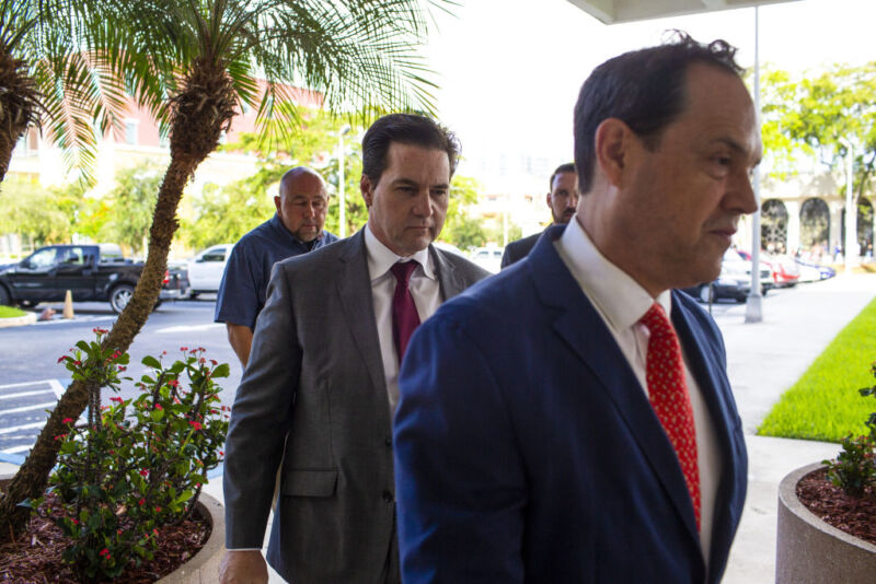 Craig Wright, self-declared inventor of bitcoin, center, arrives at federal court with his attorney Andres Rivero, right, in West Palm Beach, Florida, on Friday, June 28, 2019.
