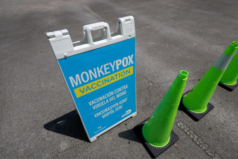 A sign announcing monkeypox vaccination is set up in Tropical Park by Miami-Dade County and Nomi Health on August 15, 2022, in Miami. 