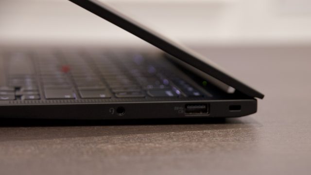 Ports on the right: a headphone jack and USB-A port.