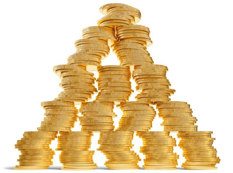 Golden coins stacked in a pyramid.
